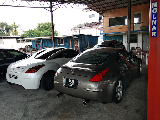Pembaikan Ekzos Kereta Terbaik Berhampiran Saya di Bakri